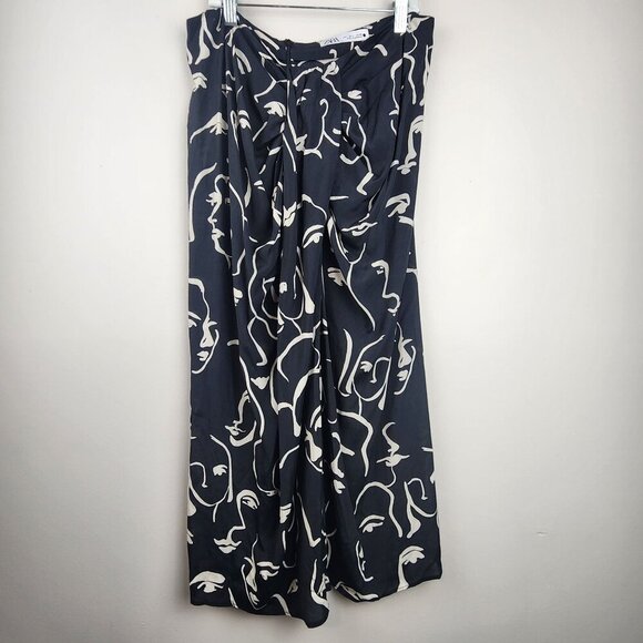 Zara Dresses & Skirts - Zara sz L women skirt Black front knot face silhouette pattern